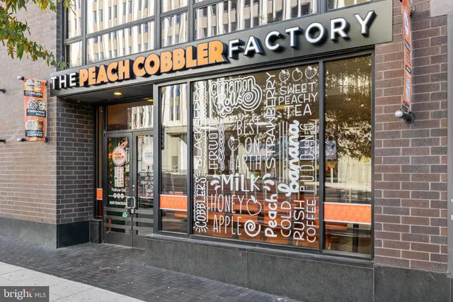 a front view of a building with parking