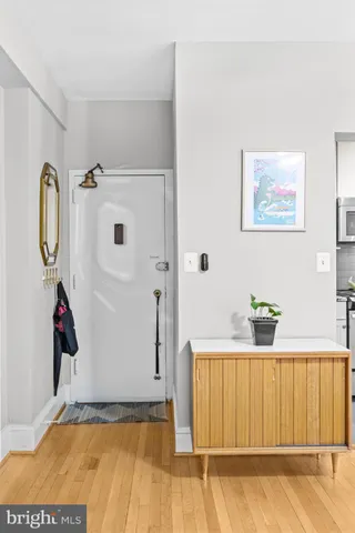 a bathroom with a tub and a shower