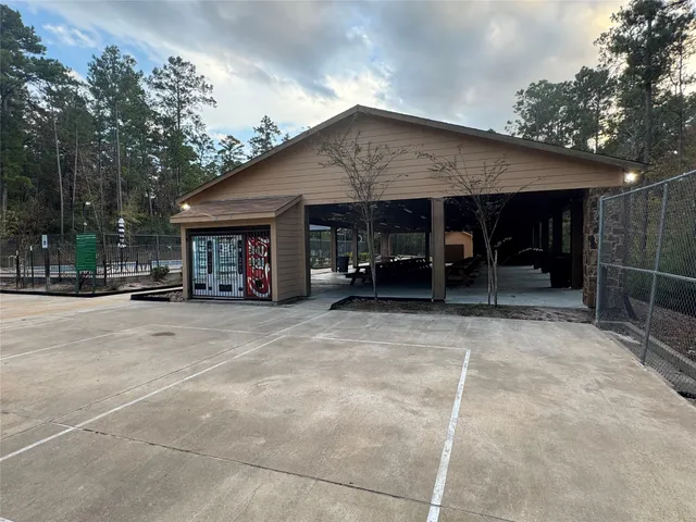 a view of a house with garage and chair
