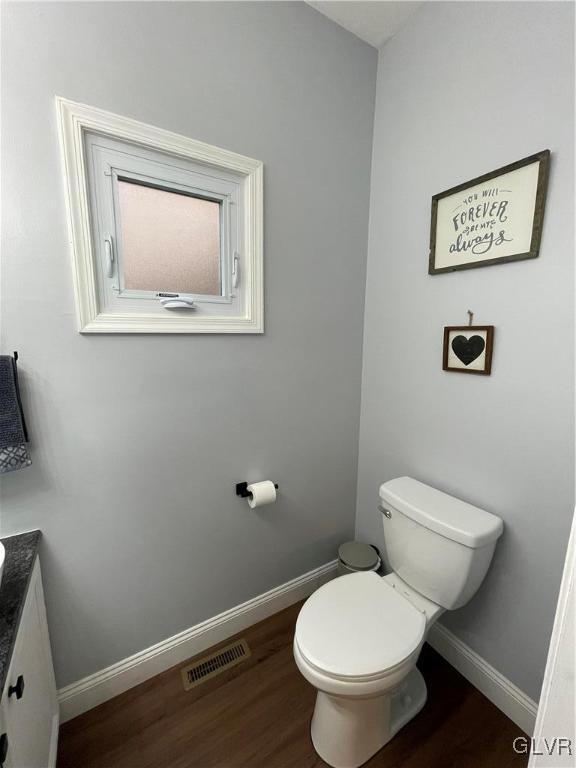 1668 Harding Circle Whitehall, PA 18052 - Photo 14 of 32 a white toilet sitting next to a bathroom sink