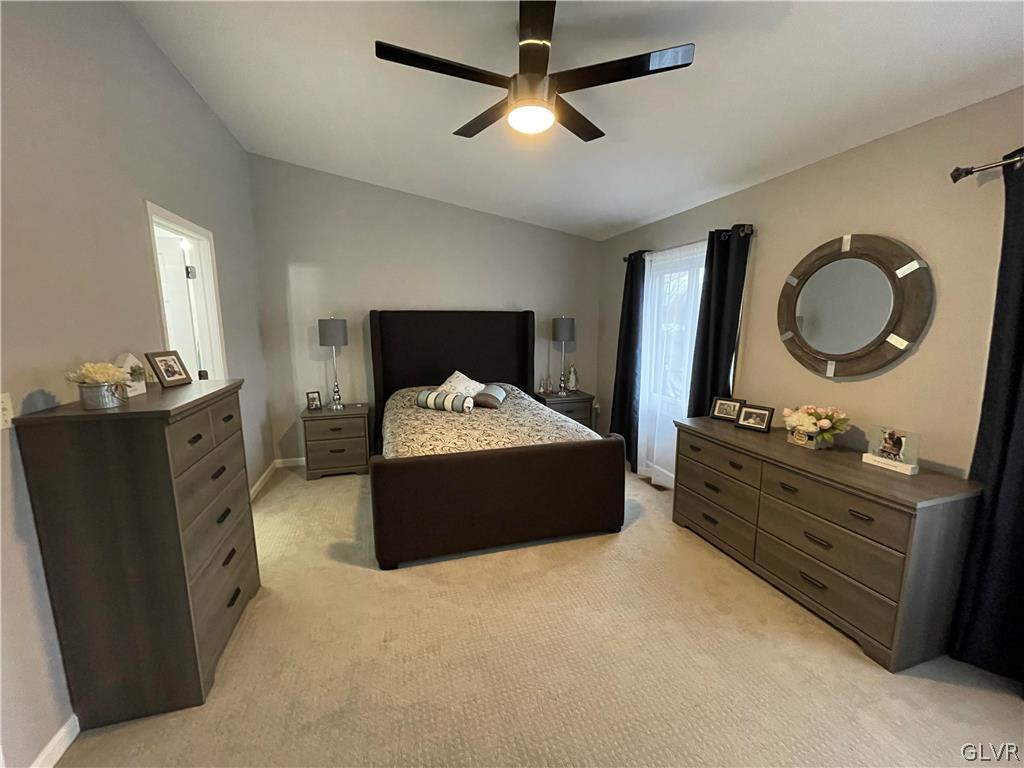 1668 Harding Circle Whitehall, PA 18052 - Photo 16 of 32 a bed room with a bed and a dresser