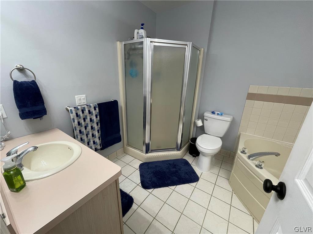 1668 Harding Circle Whitehall, PA 18052 - Photo 20 of 32 a bathroom with a sink toilet and shower