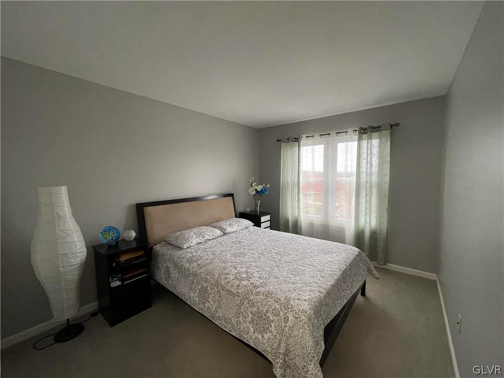 1668 Harding Circle Whitehall, PA 18052 - Photo 22 of 32 a bedroom with a bed and a window