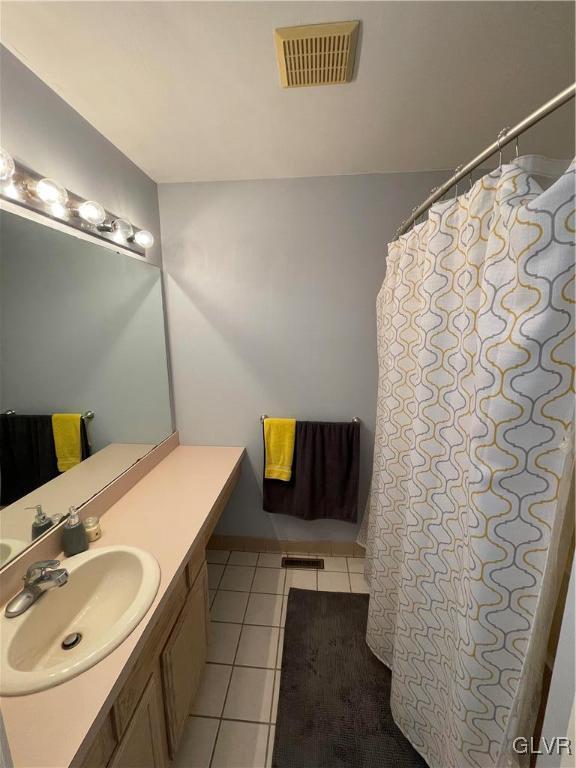 1668 Harding Circle Whitehall, PA 18052 - Photo 24 of 32 a bathroom with a sink and a mirror