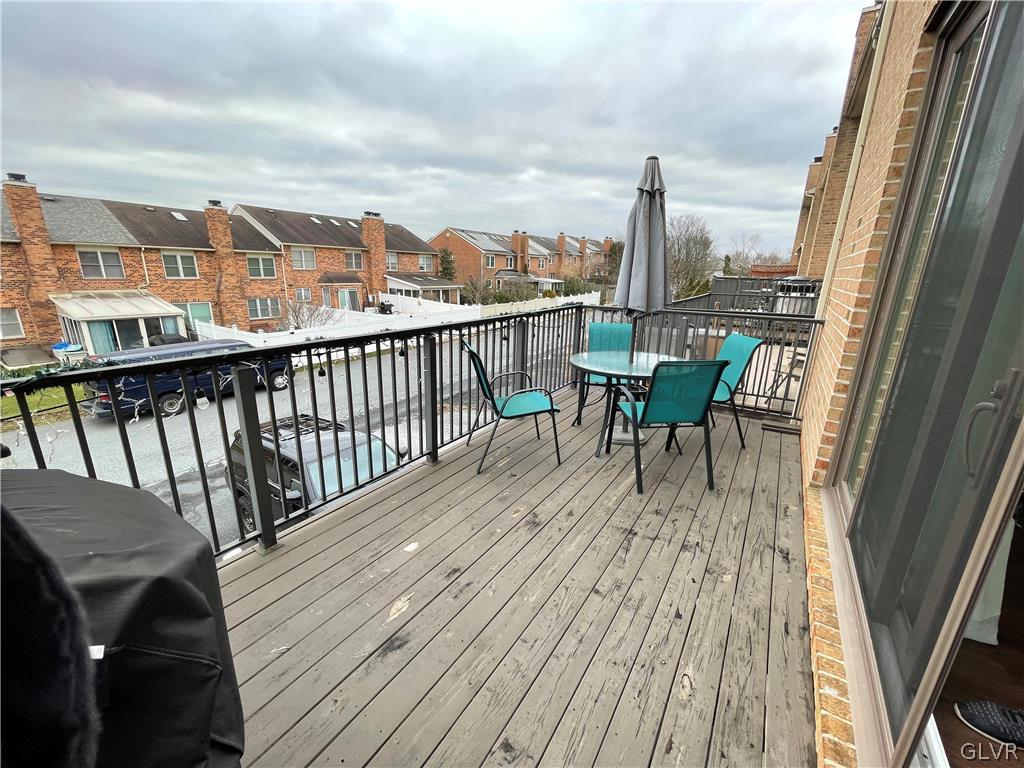 1668 Harding Circle Whitehall, PA 18052 - Photo 29 of 32 a view of a balcony with two chairs and wooden floor