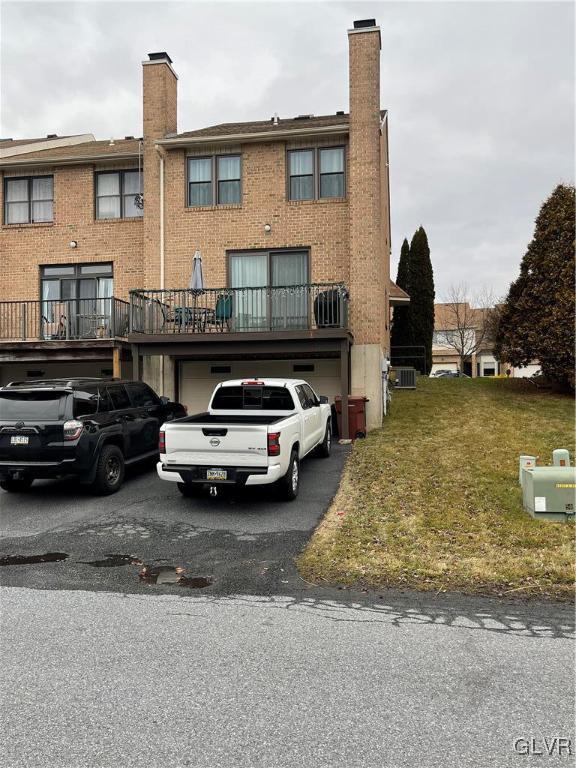1668 Harding Circle Whitehall, PA 18052 - Photo 31 of 32 a car parked in front of a house