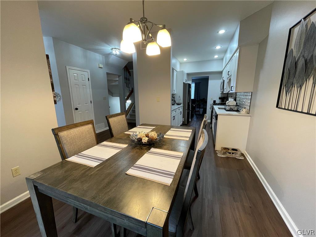 1668 Harding Circle Whitehall, PA 18052 - Photo 5 of 32 a view of a dining room with furniture and wooden floor