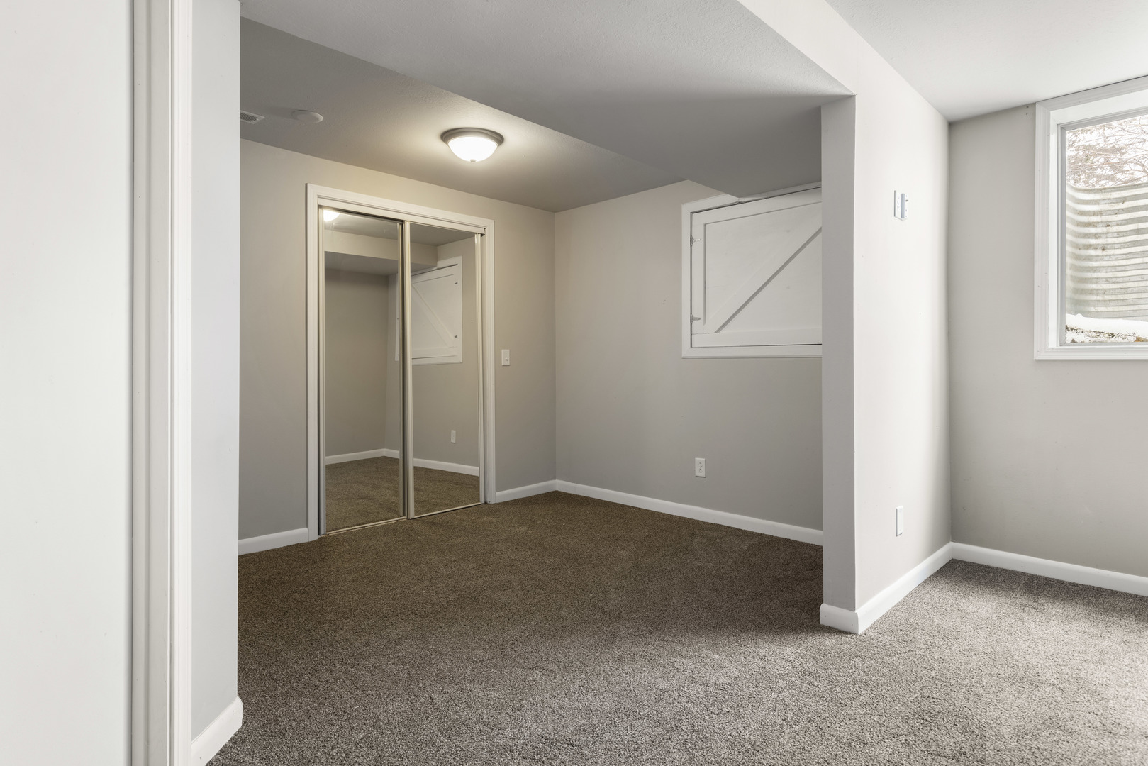 Undisclosed Address Davis, IL 61019 - Photo 16 of 21 an empty room with windows and closet