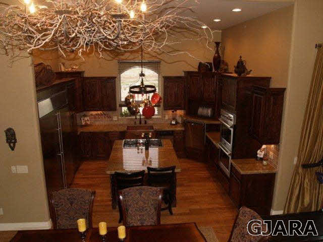 815 Mease Road Grand Junction, CO 81505 - Photo 9 of 42 a view of living room with furniture and wooden floor