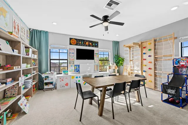 a kitchen with sink and cabinets