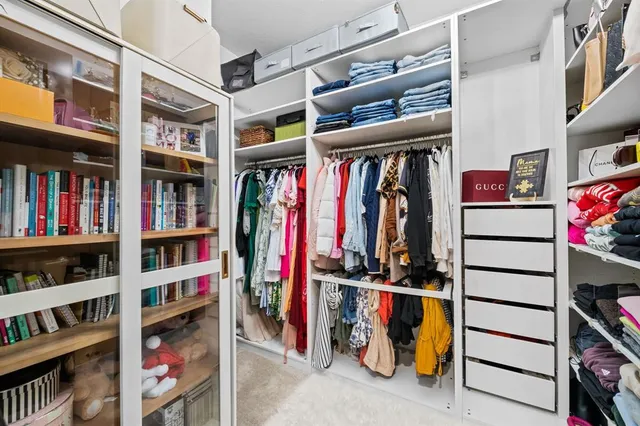 a room with furniture and a large window