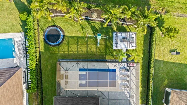 a view of outdoor space with seating area and lake view