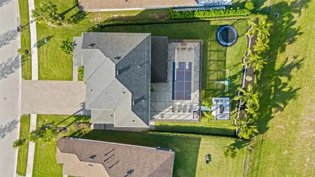 a dining room with furniture window and wooden floor