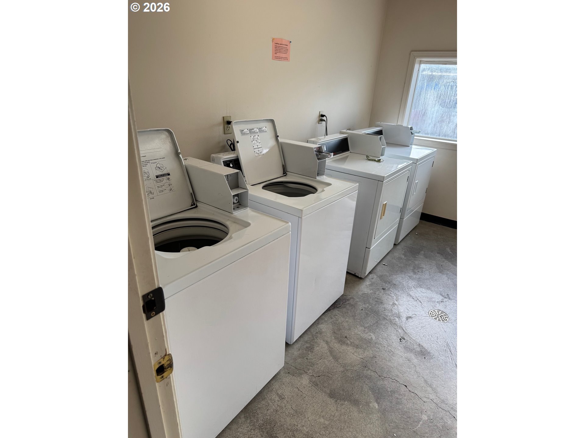 1612 Polk Street Eugene, OR 97402 - Photo 11 of 11 a utility room with dryer and washer