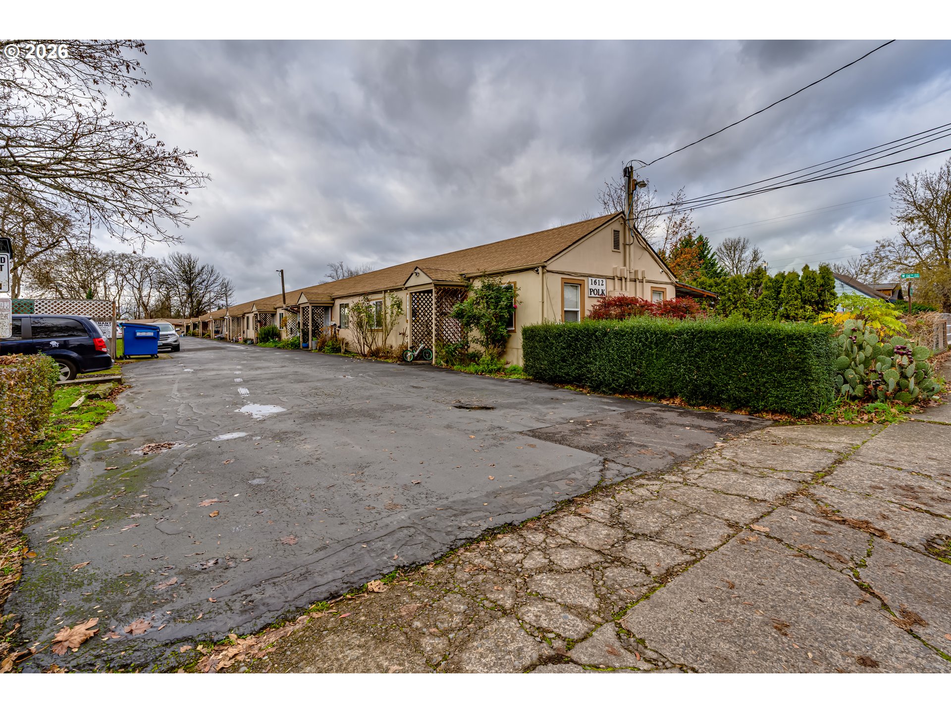 1612 Polk Street Eugene, OR 97402 - Photo 9 of 11 a view of a dirt road and a building