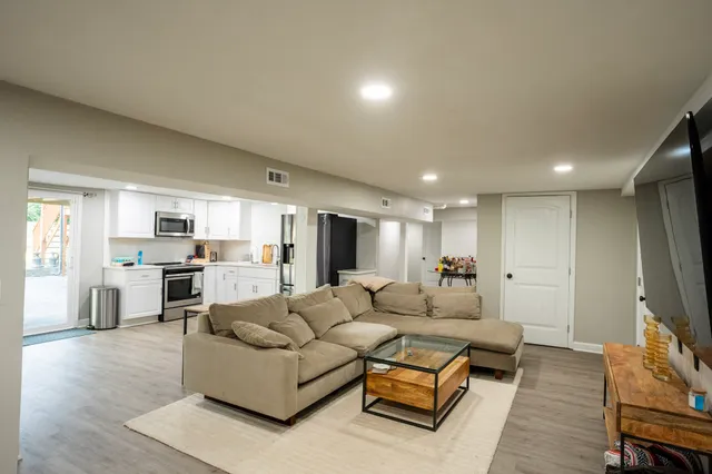 a kitchen with a refrigerator a sink and dishwasher