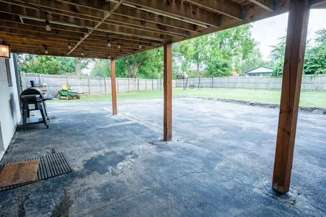 a view of a workspace with furniture and toys