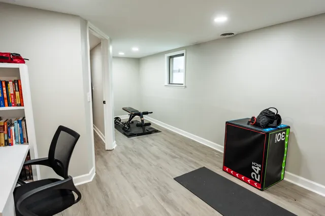 a room with furniture and a wooden floor