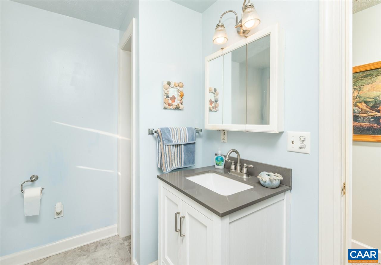 180 Phoenix Road Arrington, VA 22922 - Photo 25 of 35 a bathroom with a sink and a mirror