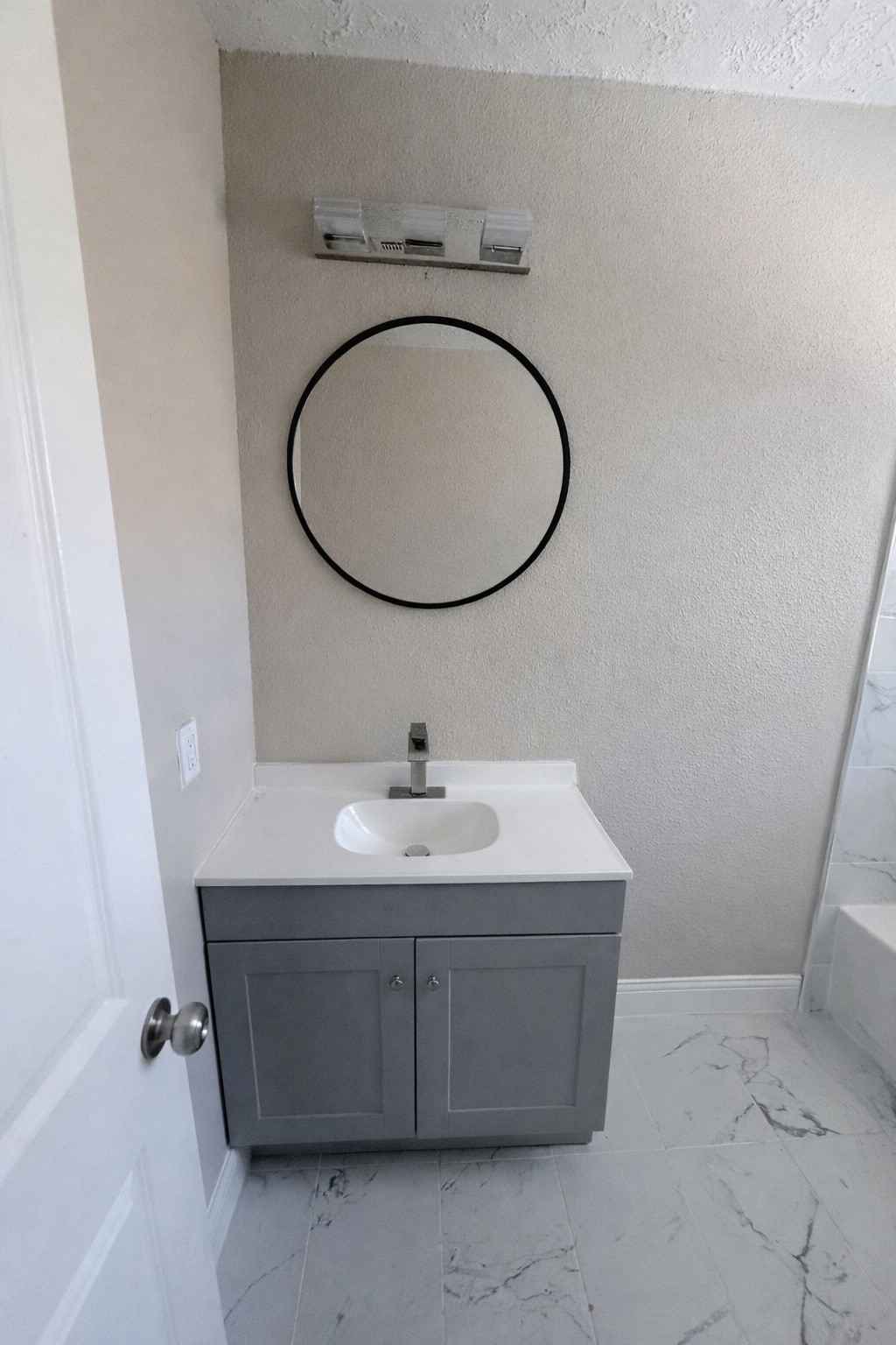 8115 Redfern Drive Houston, TX 77033 - Photo 7 of 7 a bathroom with a sink a toilet and a mirror
