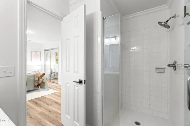 a bathroom with a sink and shower