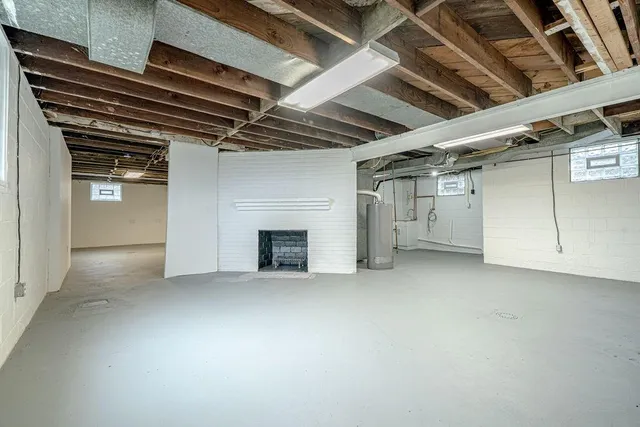 a view of empty room with white walls