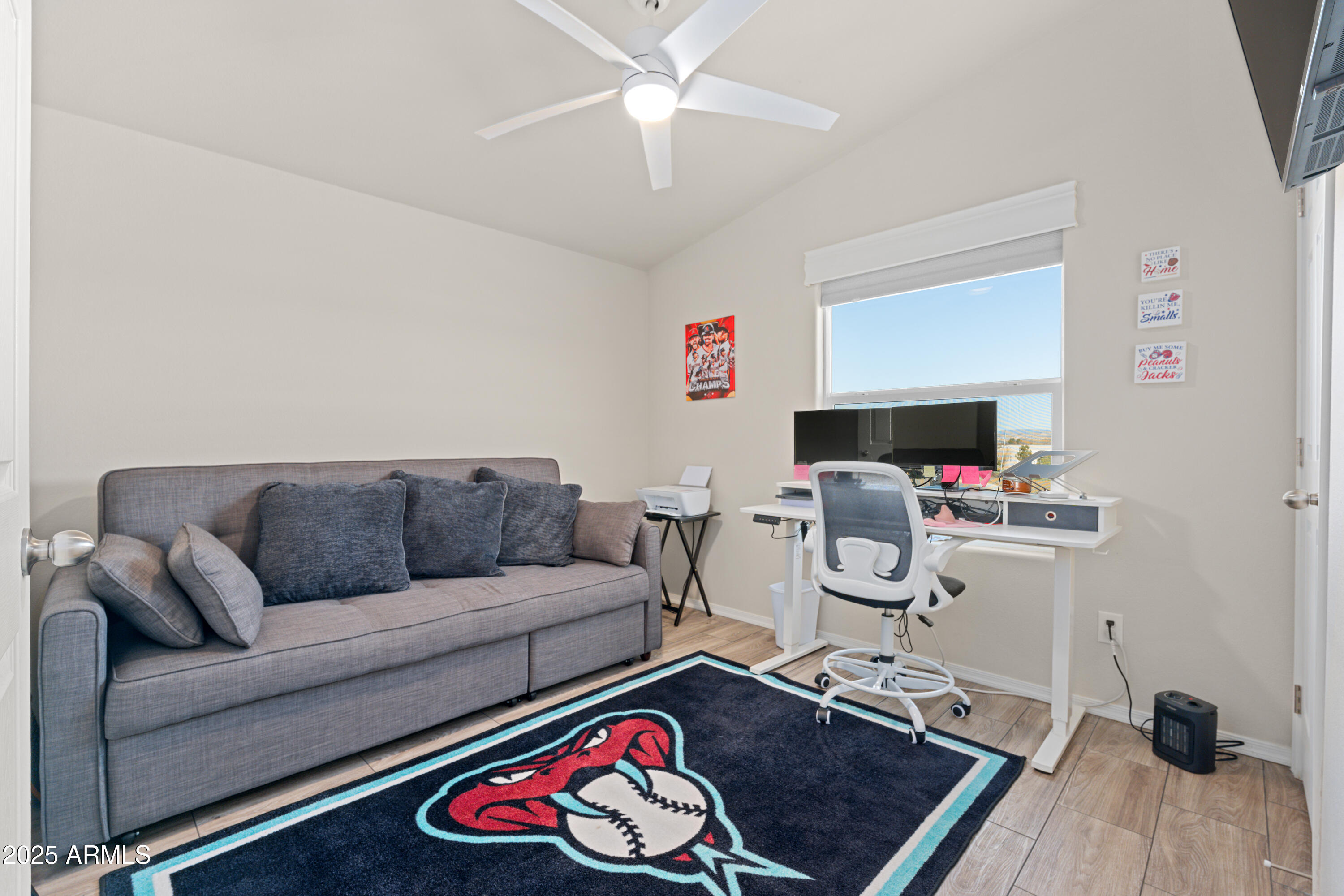1033 Wheeler Road Camp Verde, AZ 86322 - Photo 22 of 51 a living room with furniture and a wooden floor