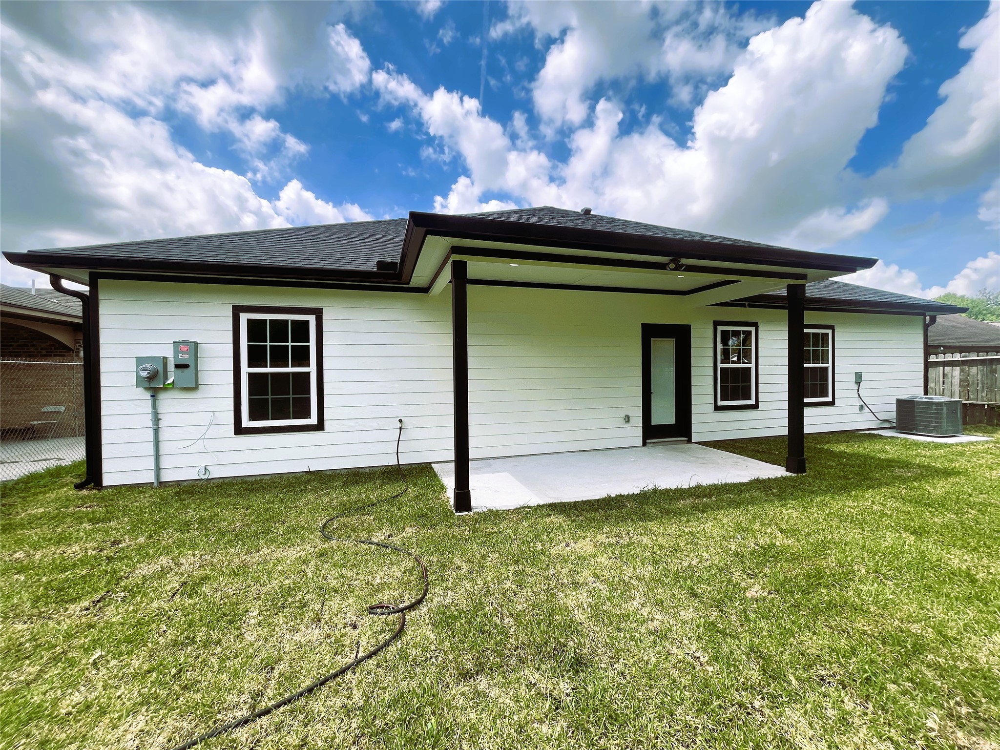 8914 Ivy Spring Lane Houston, TX 77088 - Photo 29 of 33 a view of a house with a yard
