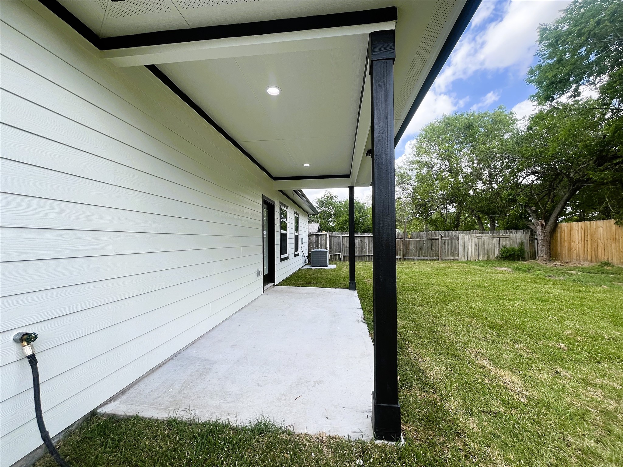 8914 Ivy Spring Lane Houston, TX 77088 - Photo 30 of 33 a view of backyard of house