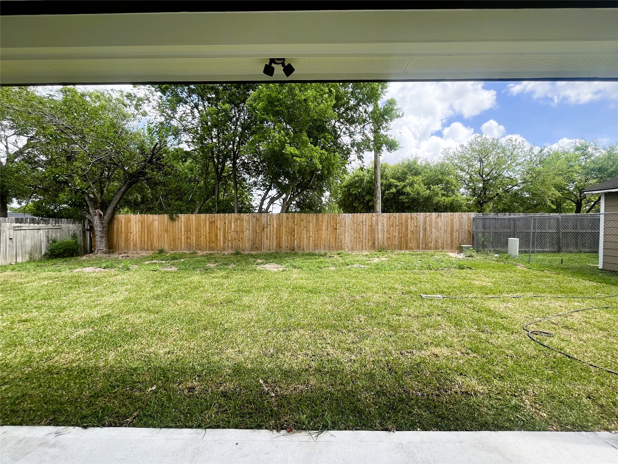 8914 Ivy Spring Lane Houston, TX 77088 - Photo 32 of 33 a view of a backyard