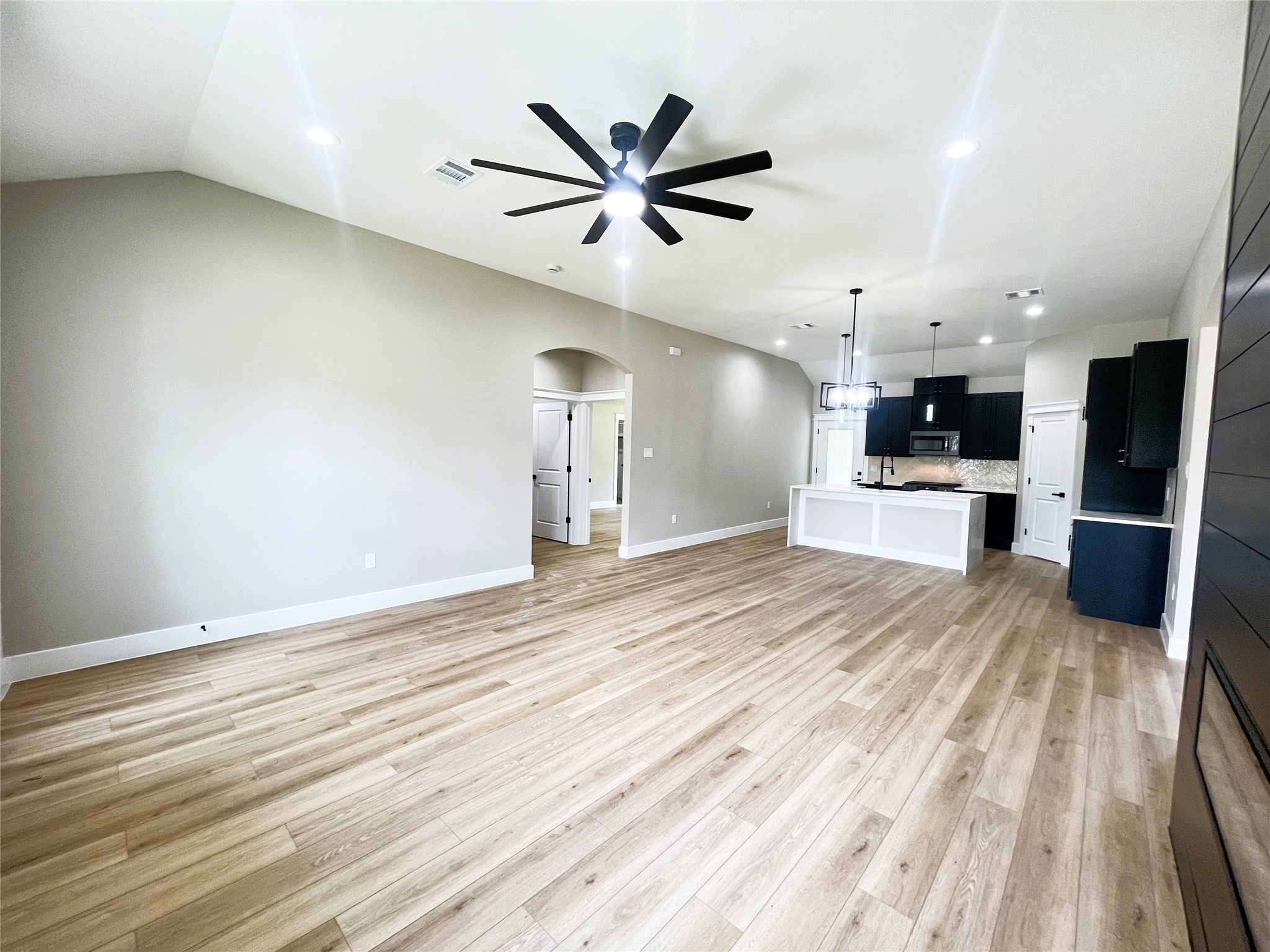 8914 Ivy Spring Lane Houston, TX 77088 - Photo 6 of 33 a view of a kitchen with a sink and a stove top oven