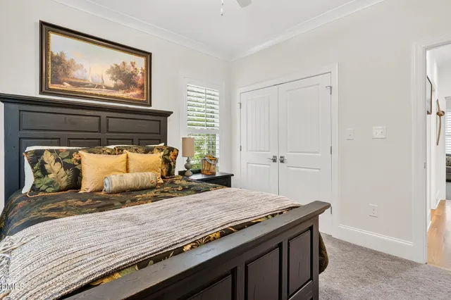 a living room with fireplace furniture and a flat screen tv