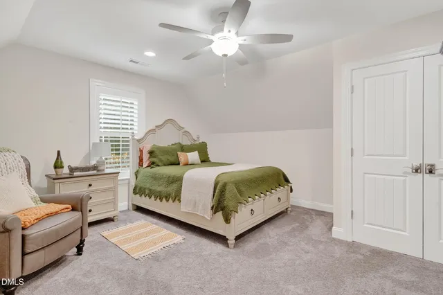 a living room with furniture pool table and a fireplace