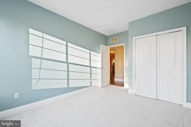a bathroom with a sink a vanity and a mirror