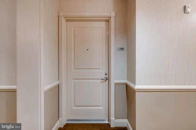 a view of parking garage with cars parked