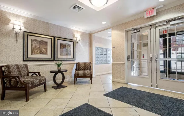 an aerial view of a house with garden space and street view