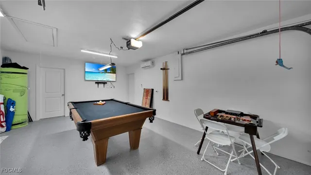 a room with furniture and a flat screen tv