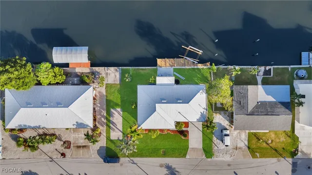 an aerial view of a house with a garden