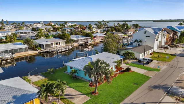 an aerial view of a house with a garden