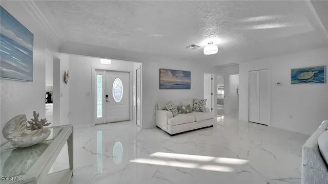 a living room with furniture and a couch