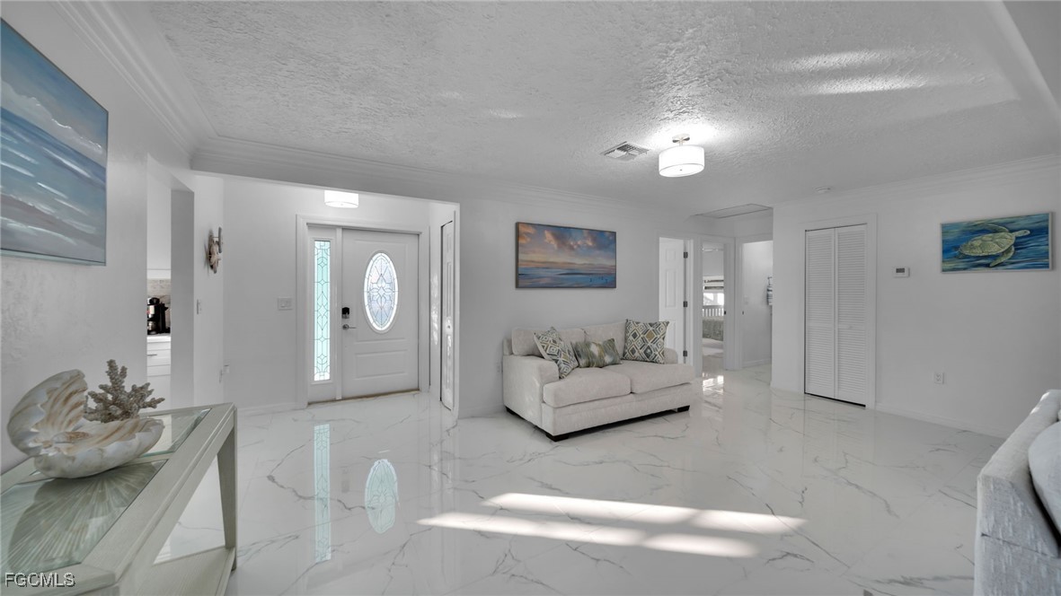 2758 Bruce Street Matlacha, FL 33993 - Photo 8 of 35 a living room with furniture and a couch