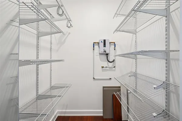 a view of a swimming pool with a lounge chairs