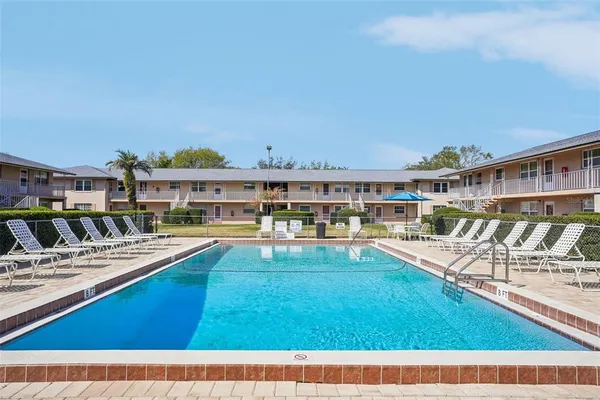 a view of a house with a swimming pool