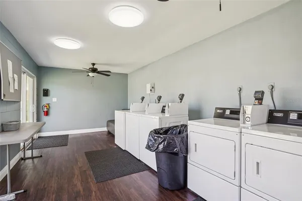 a view of a chairs and table in a patio