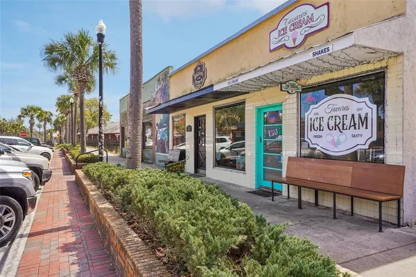 a view of swimming pool with seating space