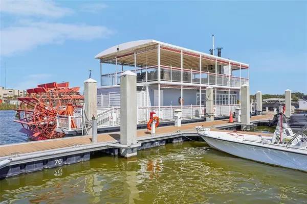 a kitchen with a table and chairs in it