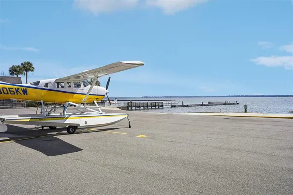 a kitchen with stainless steel appliances a sink and a refrigerator