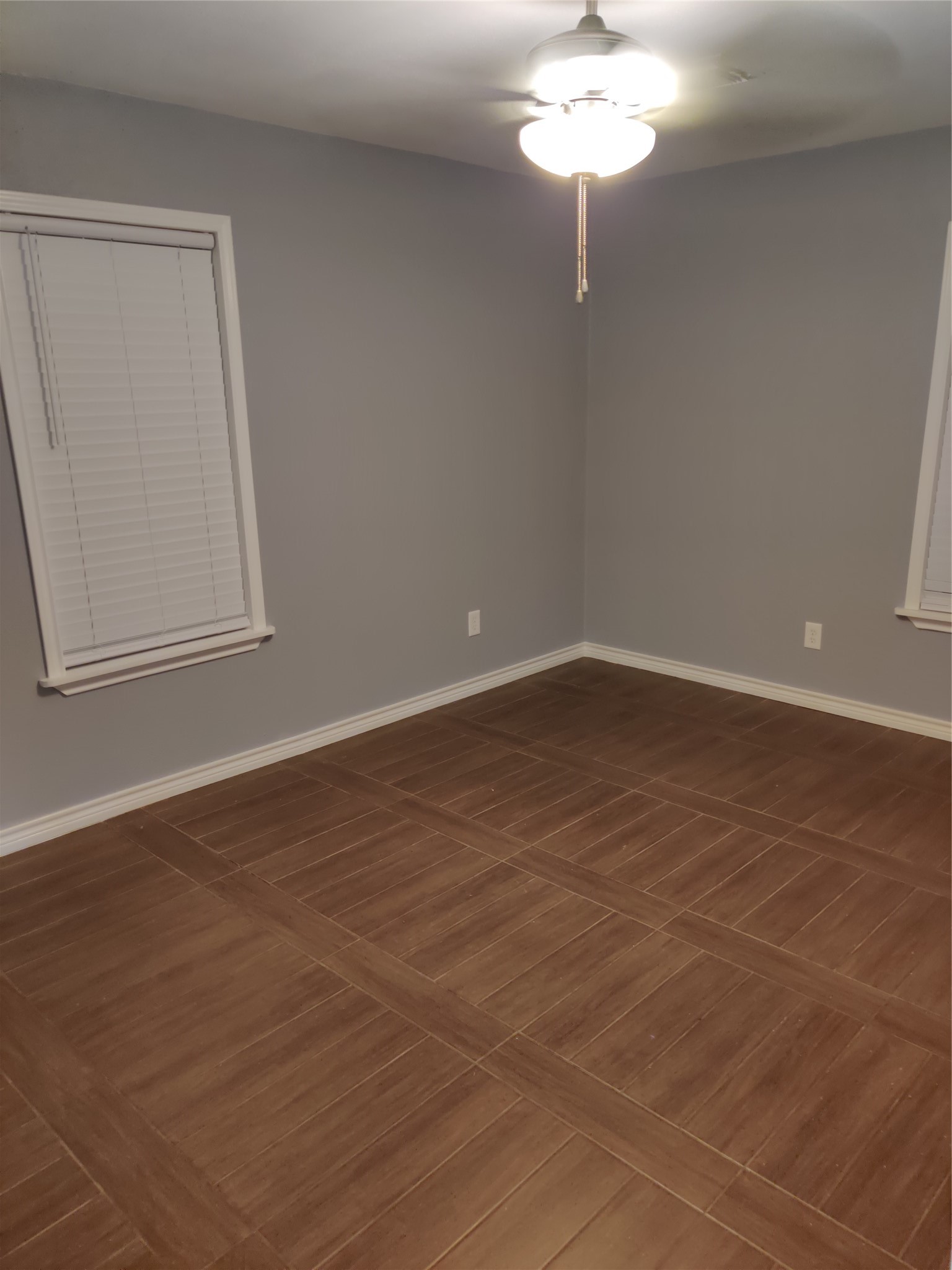 3314 Fern Street Pasadena, TX 77503 - Photo 13 of 14 a view of a small space with wooden floor and a chandelier