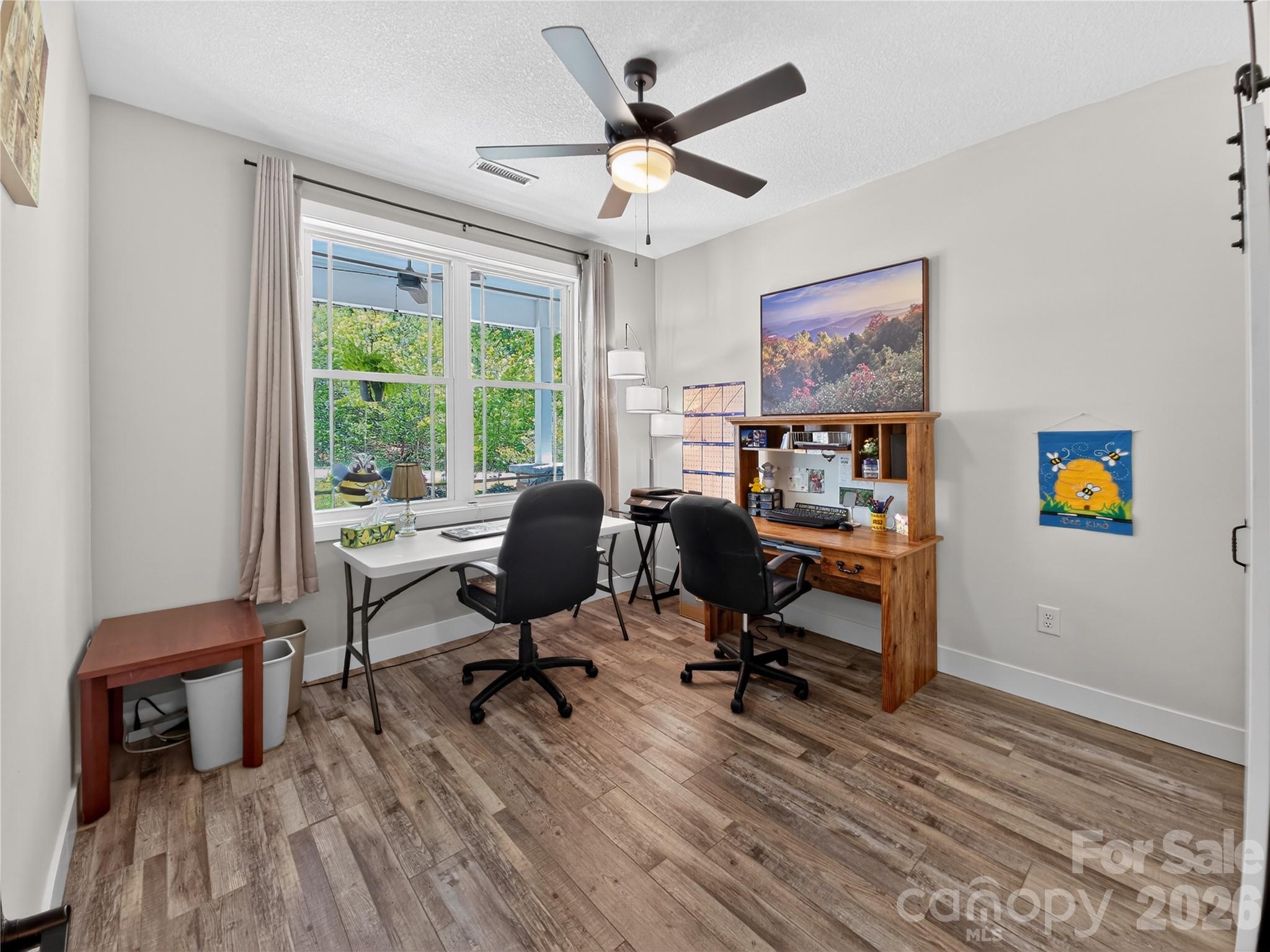 278 Hunters Trace Rutherfordton, NC 28139 - Photo 28 of 33 a view of a workspace with furniture and a window