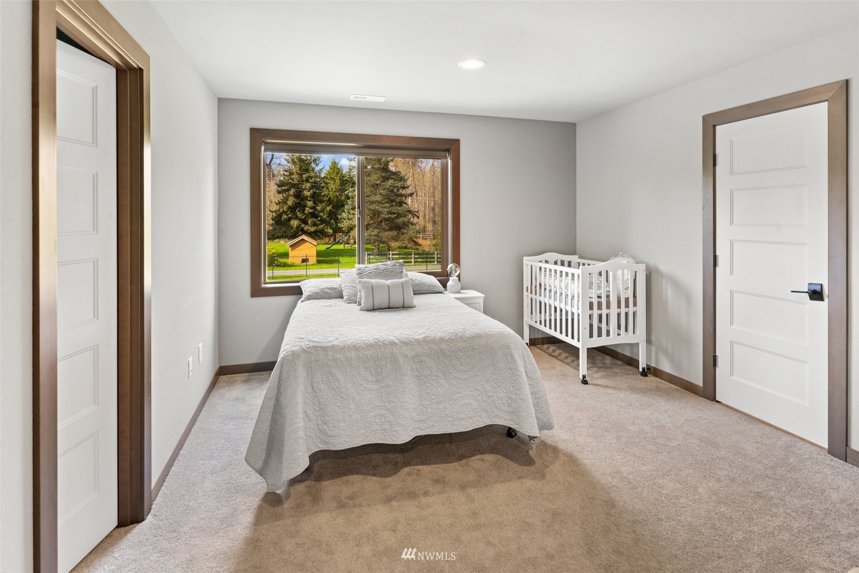19129 43rd Avenue Southeast Bothell, WA 98012 - Photo 23 of 34 a bed room with a bed and a window
